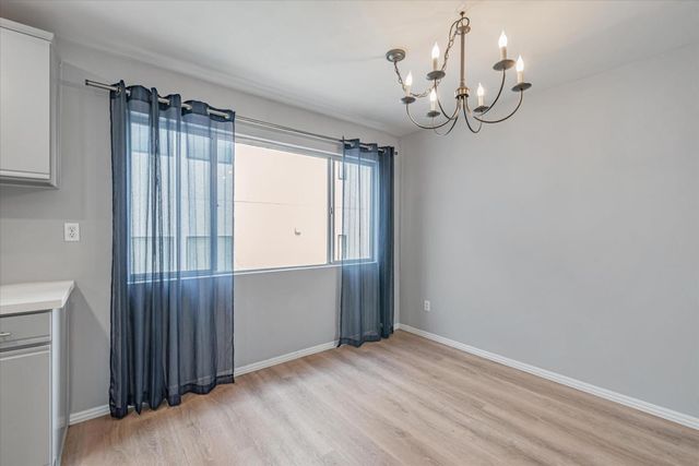 a view of a chandelier in a room