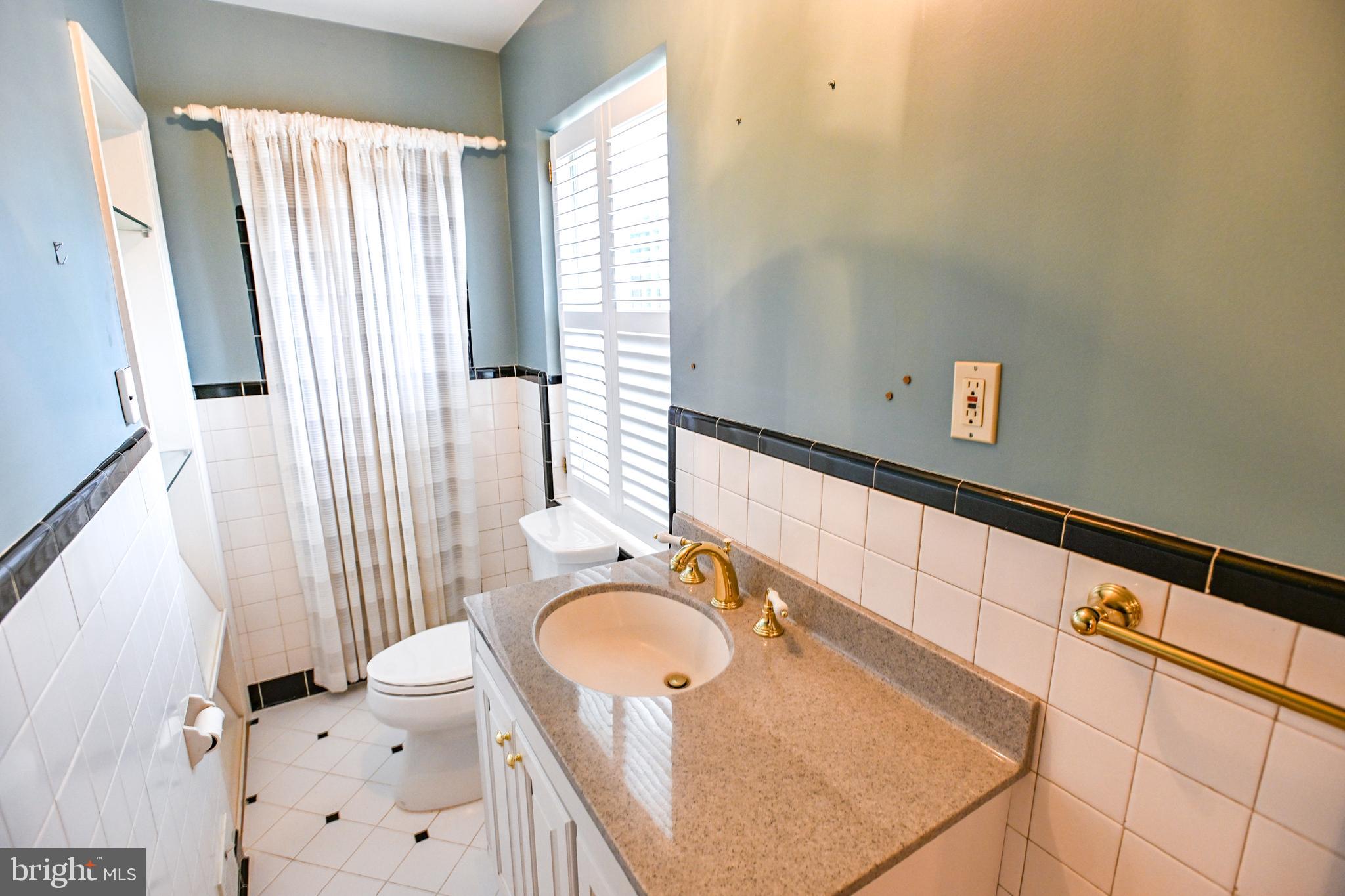 8031 Glendale Road Chevy Chase, MD 20815 - Photo 22 of 72 1st floor Bath w/ Shower