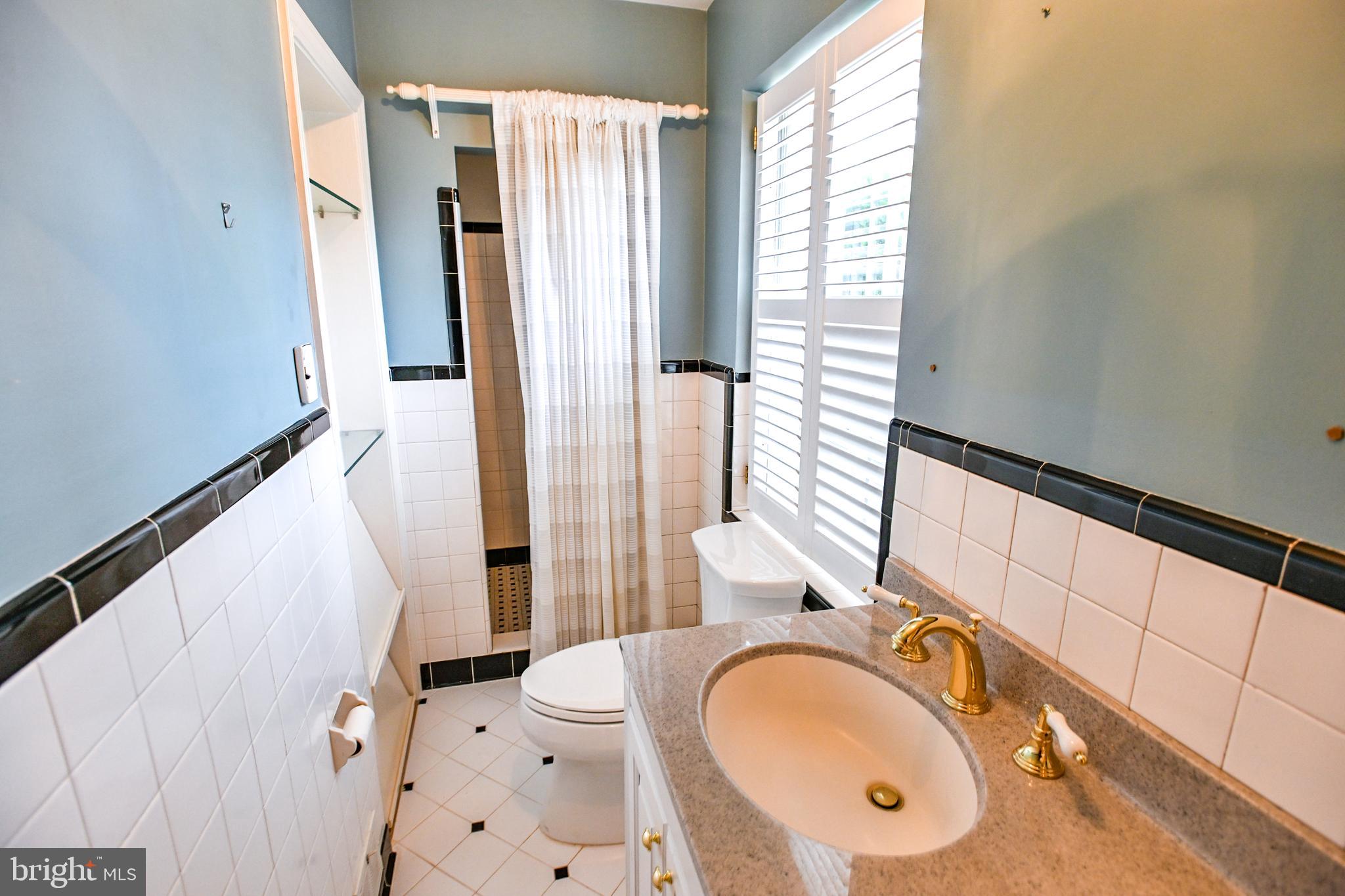 8031 Glendale Road Chevy Chase, MD 20815 - Photo 23 of 72 1st floor Bath w/ Shower