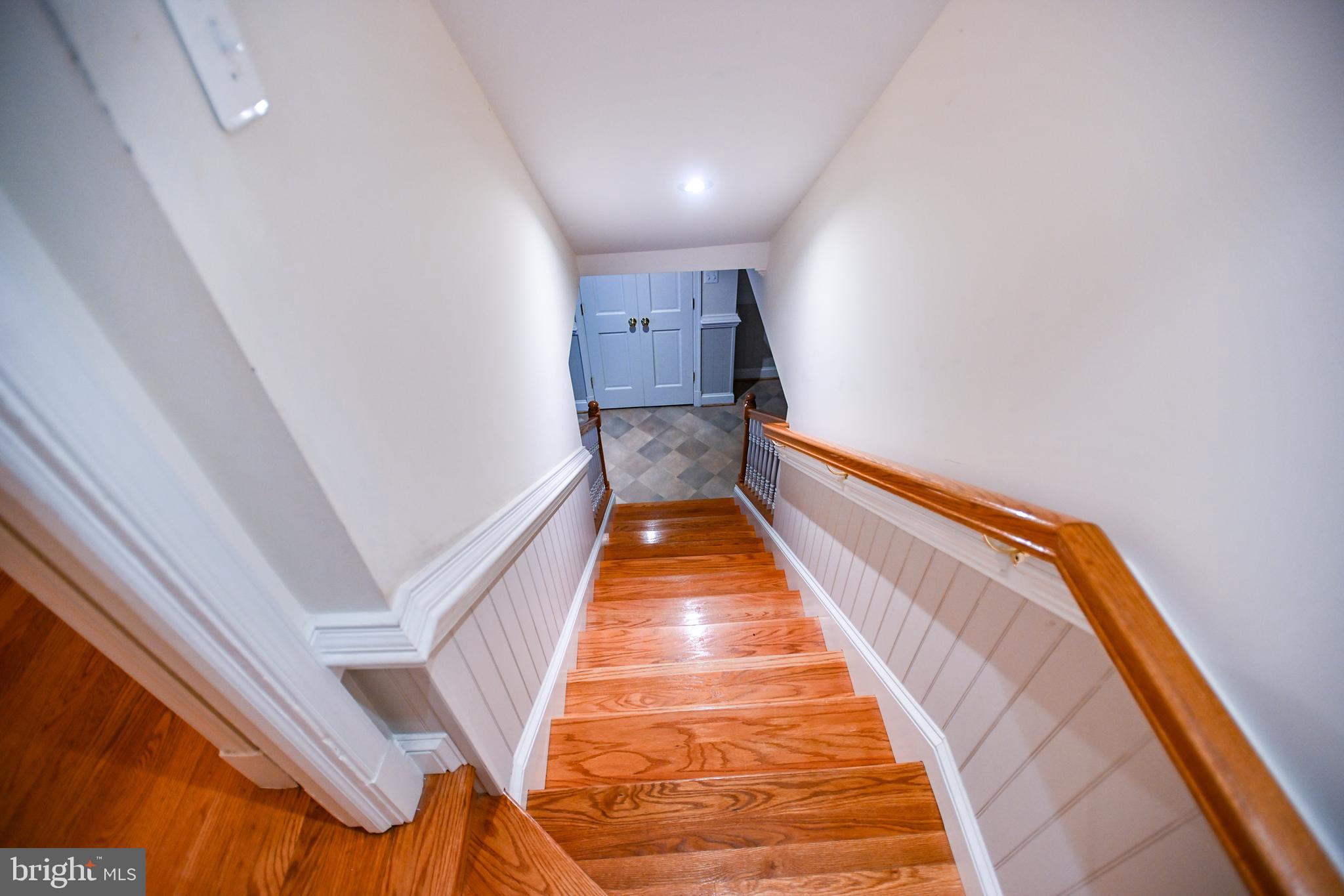 8031 Glendale Road Chevy Chase, MD 20815 - Photo 55 of 72 Staircase to Basement Recreation Room