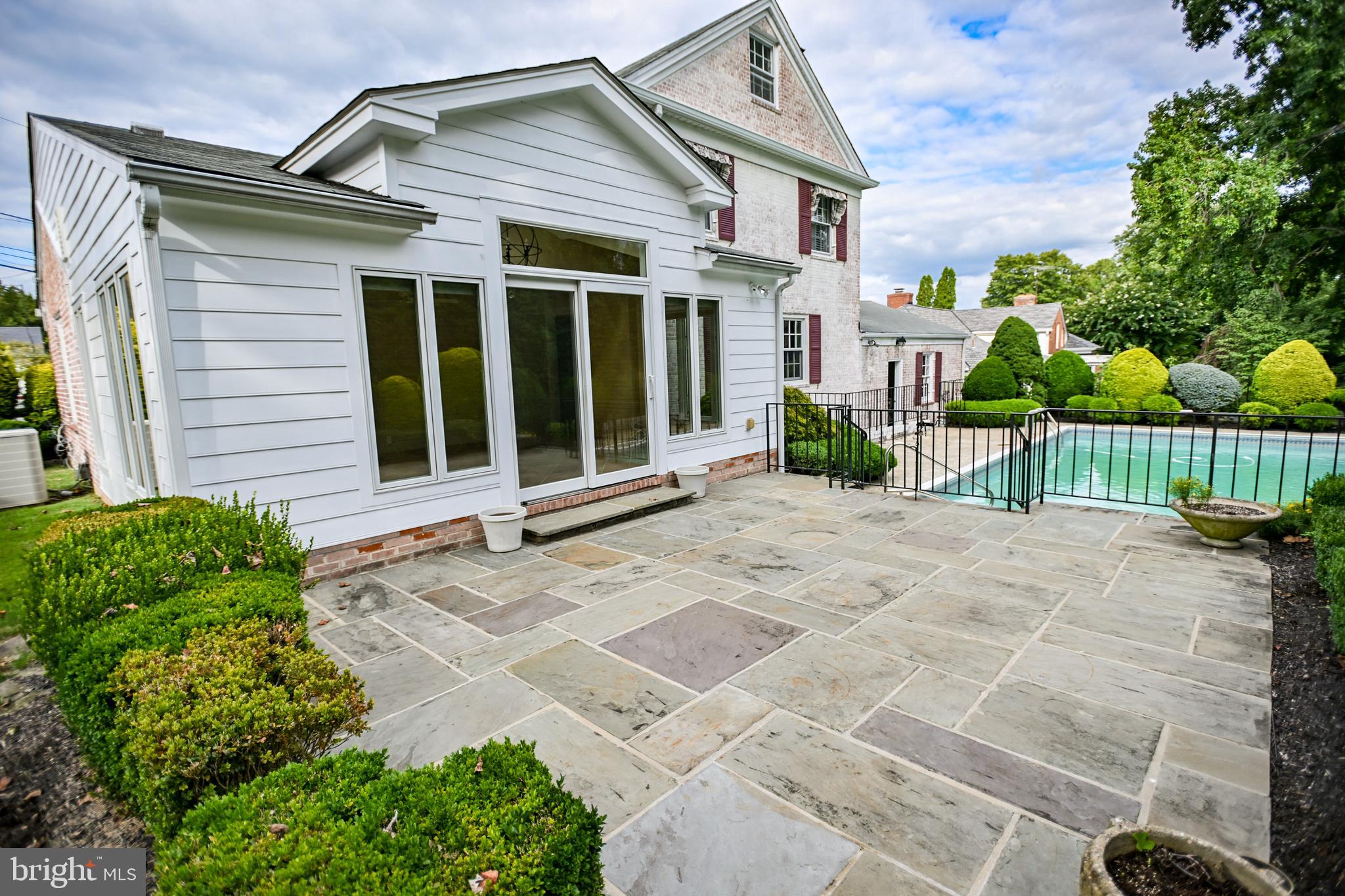 8031 Glendale Road Chevy Chase, MD 20815 - Photo 60 of 72 Spacious Blue Stone Patio off of Sunroom