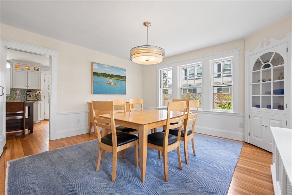 8 Charlotte Road Marblehead, MA 01945 - Photo 12 of 37 a view of a dining room with furniture window and wooden floor