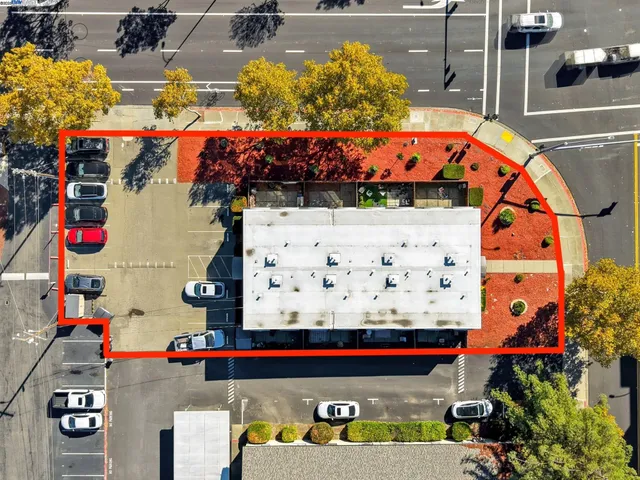 a aerial view of a house with a yard