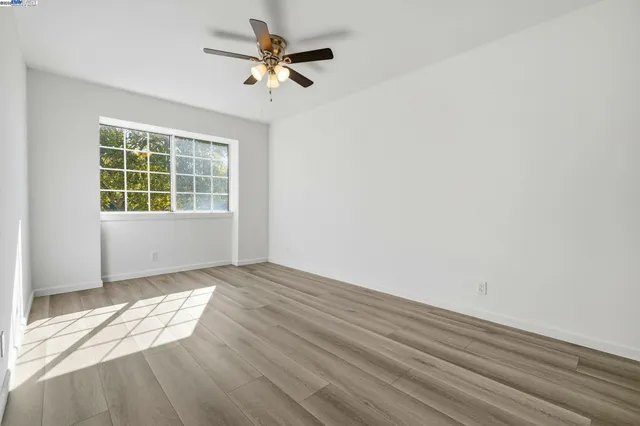a bathroom with a sink toilet vanity and shower