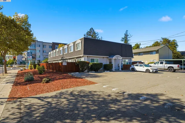 an aerial view of a house with a ocean view