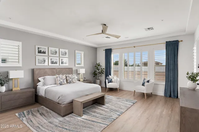 a large bathroom with a large tub and sink
