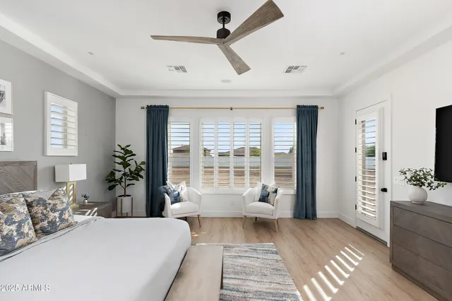 a bathroom with a double vanity sink tub double and mirror