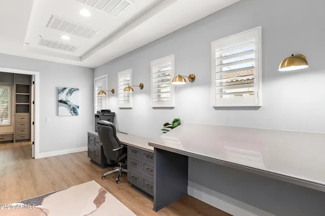 a bathroom with a sink toilet a mirror and shower