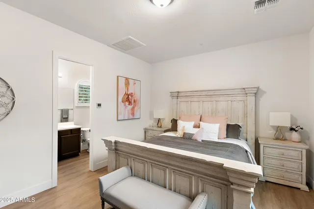 a kitchen with stainless steel appliances granite countertop a refrigerator sink and stove