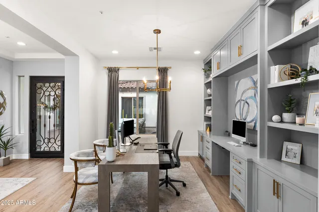 a kitchen with a sink and a refrigerator