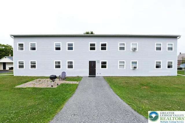 a front view of house with yard