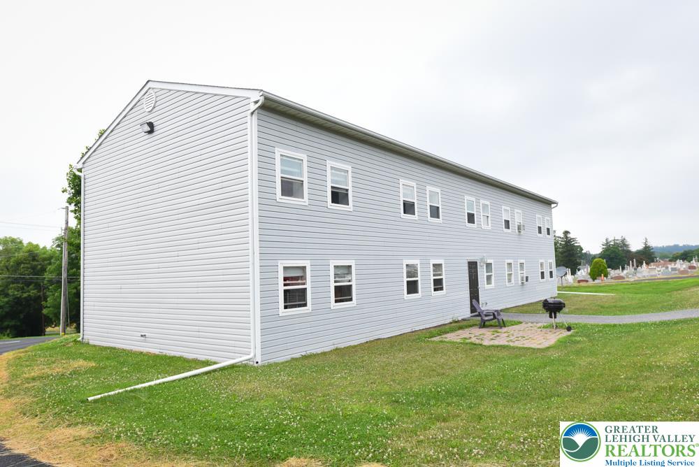7404 Allemaengel Road, Unit 2 New Tripoli, PA 18066 - Photo 3 of 13 a view of a house with backyard