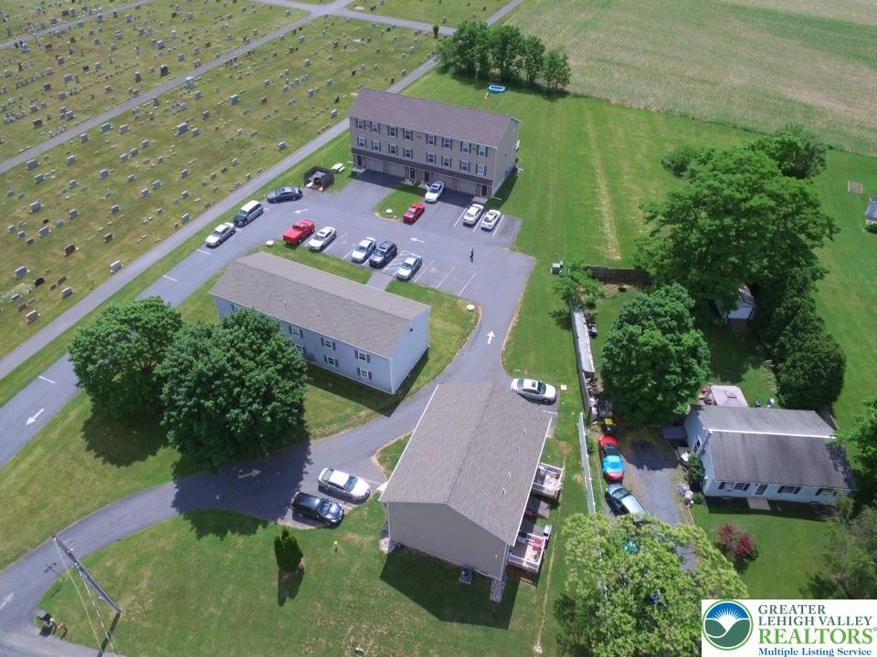 7404 Allemaengel Road, Unit 2 New Tripoli, PA 18066 - Photo 4 of 13 an aerial view of a house with a garden