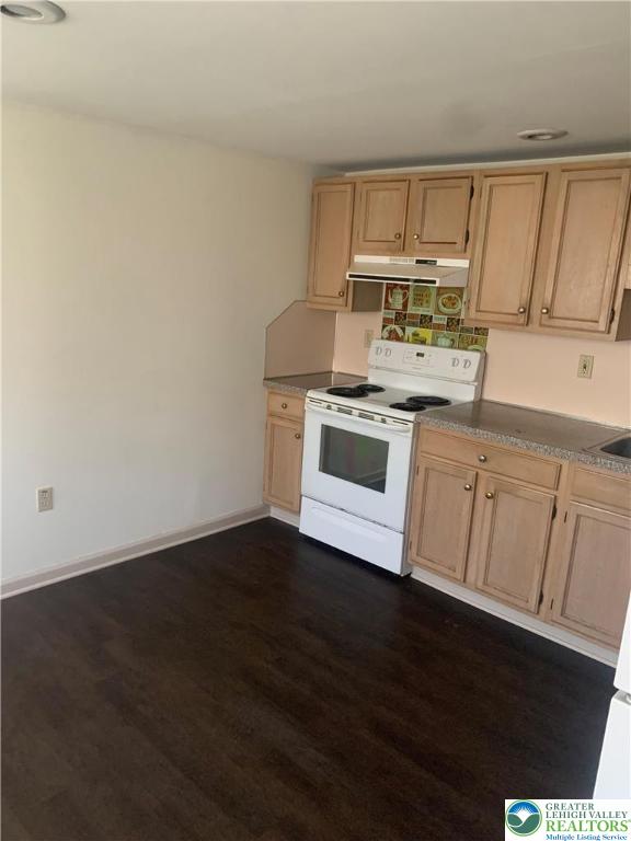 7404 Allemaengel Road, Unit 2 New Tripoli, PA 18066 - Photo 10 of 13 a kitchen with a stove a sink and a microwave
