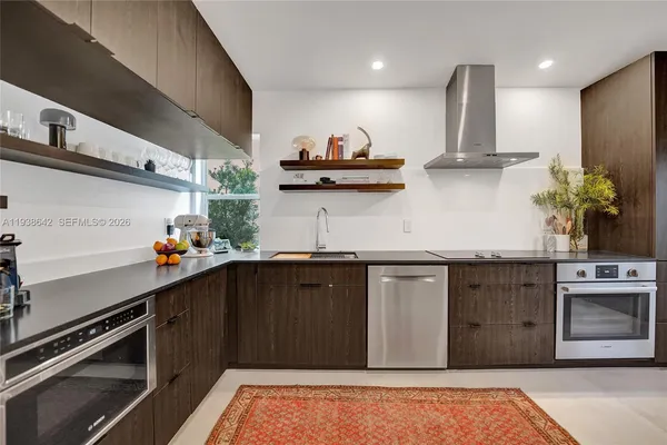 a bedroom with a bed and furniture