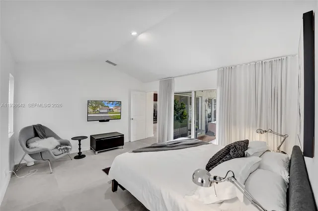 a house view with a sitting space and garden space