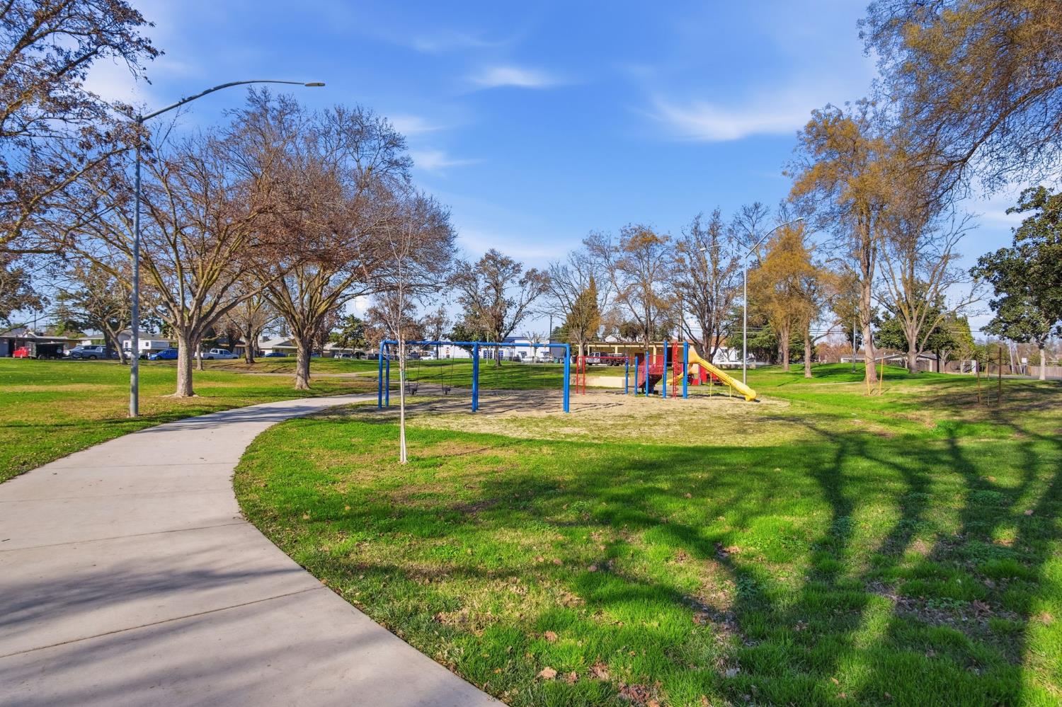 816 Dawn Drive Modesto, CA 95350 - Photo 22 of 22 a park view with large trees