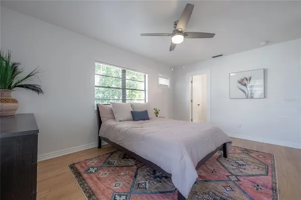 a kitchen with stainless steel appliances a refrigerator and a stove top oven