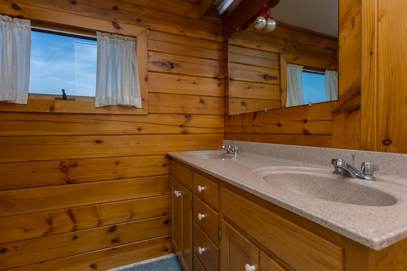 1003 Natural Chimney Road Mount Solon, VA 22843 - Photo 21 of 73 a bathroom with a sink and a mirror