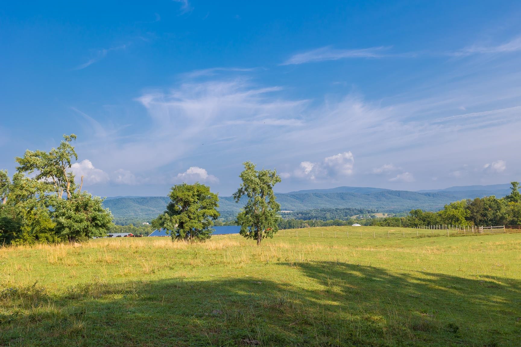 1003 Natural Chimney Road Mount Solon, VA 22843 - Photo 25 of 73 a view of a lake with a big yard