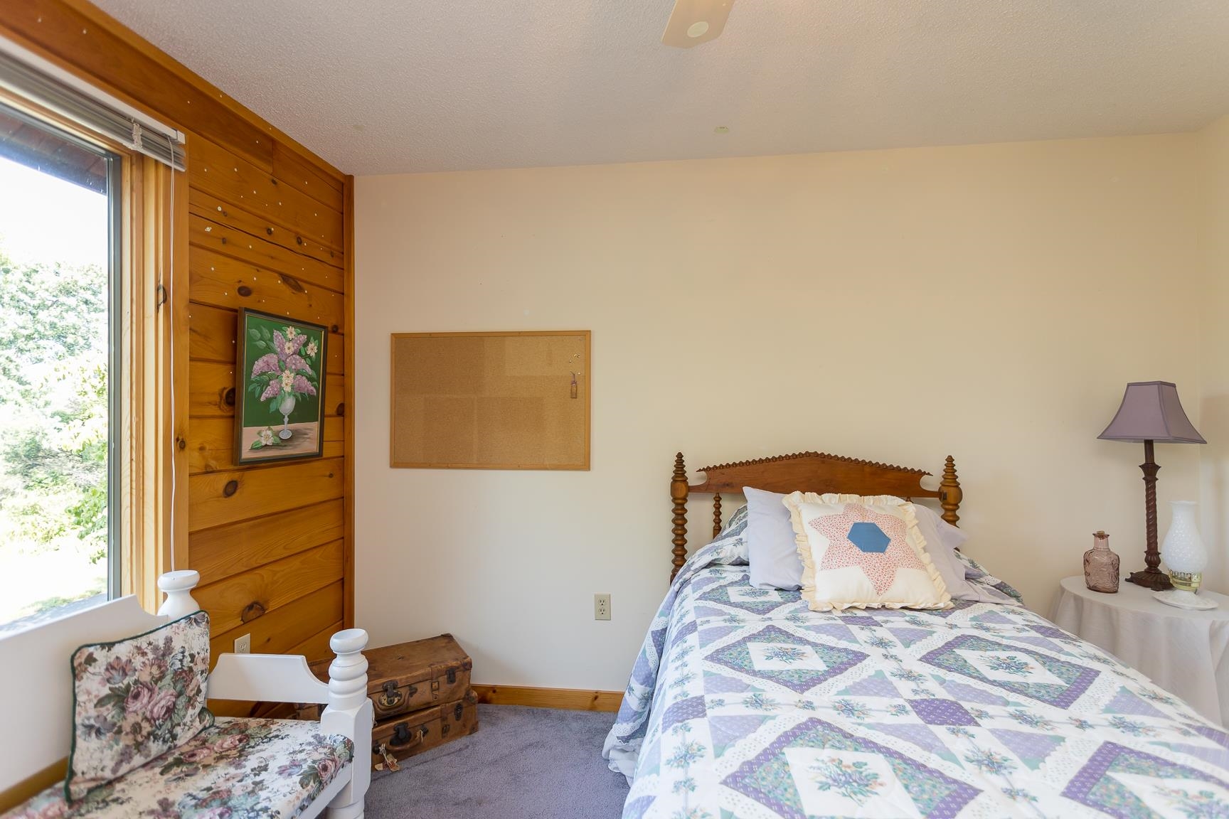 1003 Natural Chimney Road Mount Solon, VA 22843 - Photo 30 of 73 a bedroom with a bed and wooden floor