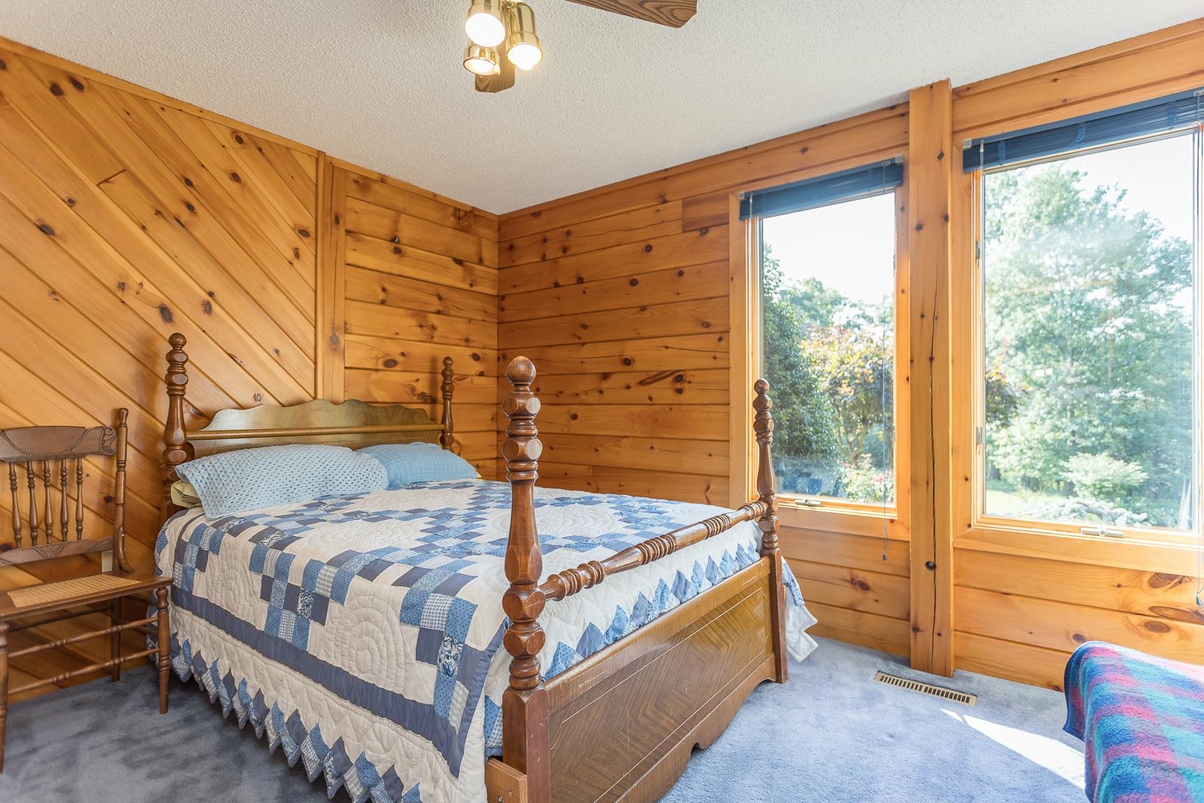 1003 Natural Chimney Road Mount Solon, VA 22843 - Photo 35 of 73 a bedroom with a bed and windows