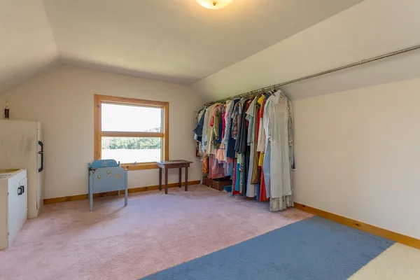 a bed room with a bed and a couch