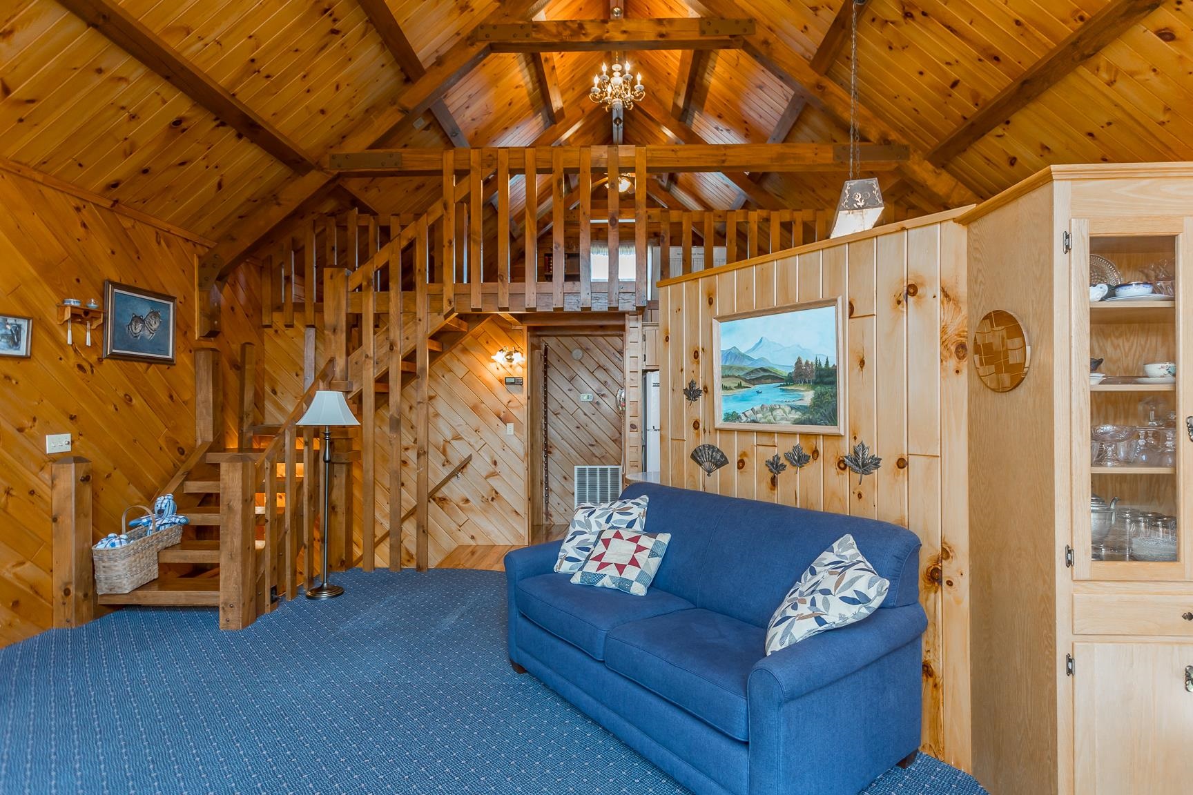 1003 Natural Chimney Road Mount Solon, VA 22843 - Photo 51 of 73 a living room with furniture and a chandelier