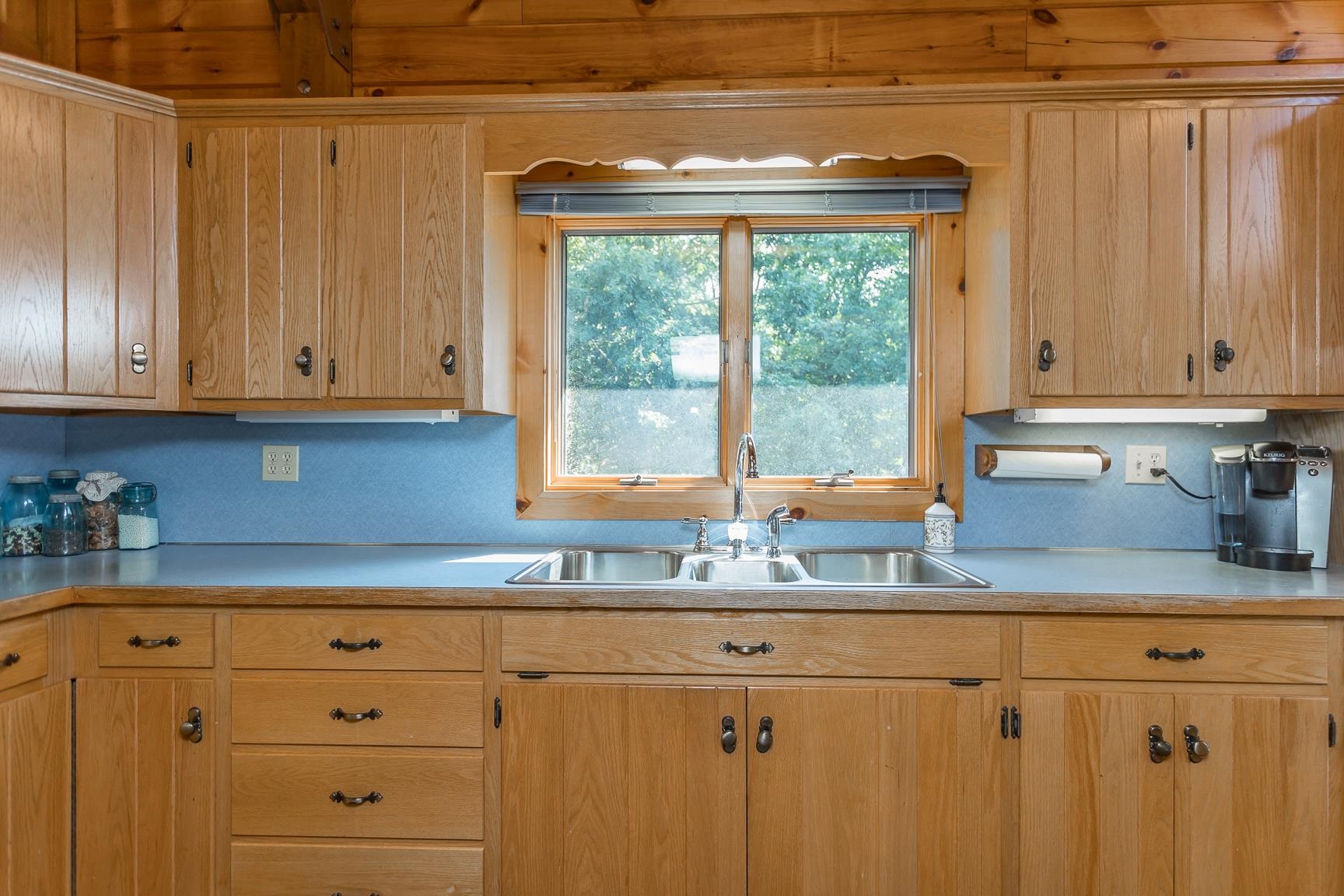 1003 Natural Chimney Road Mount Solon, VA 22843 - Photo 54 of 73 a kitchen with granite countertop cabinets and window