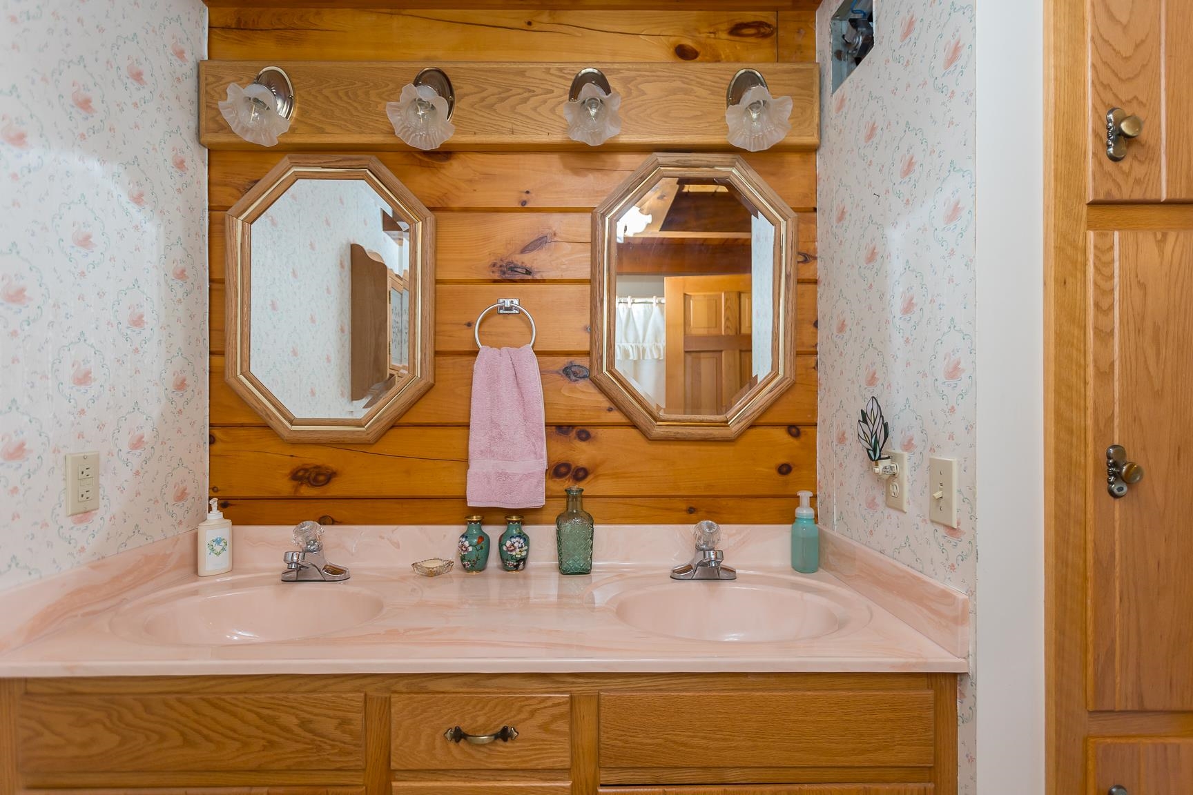 1003 Natural Chimney Road Mount Solon, VA 22843 - Photo 60 of 73 a bathroom with a sink and a mirror