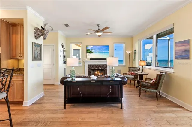 a large kitchen with a table and chairs