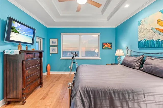 a bedroom with a bed and a cabinets