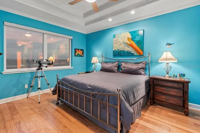 a bathroom with a granite countertop sink a toilet mirror and bathtub