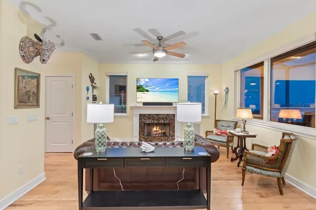 a kitchen with stainless steel appliances granite countertop a refrigerator a stove and a sink