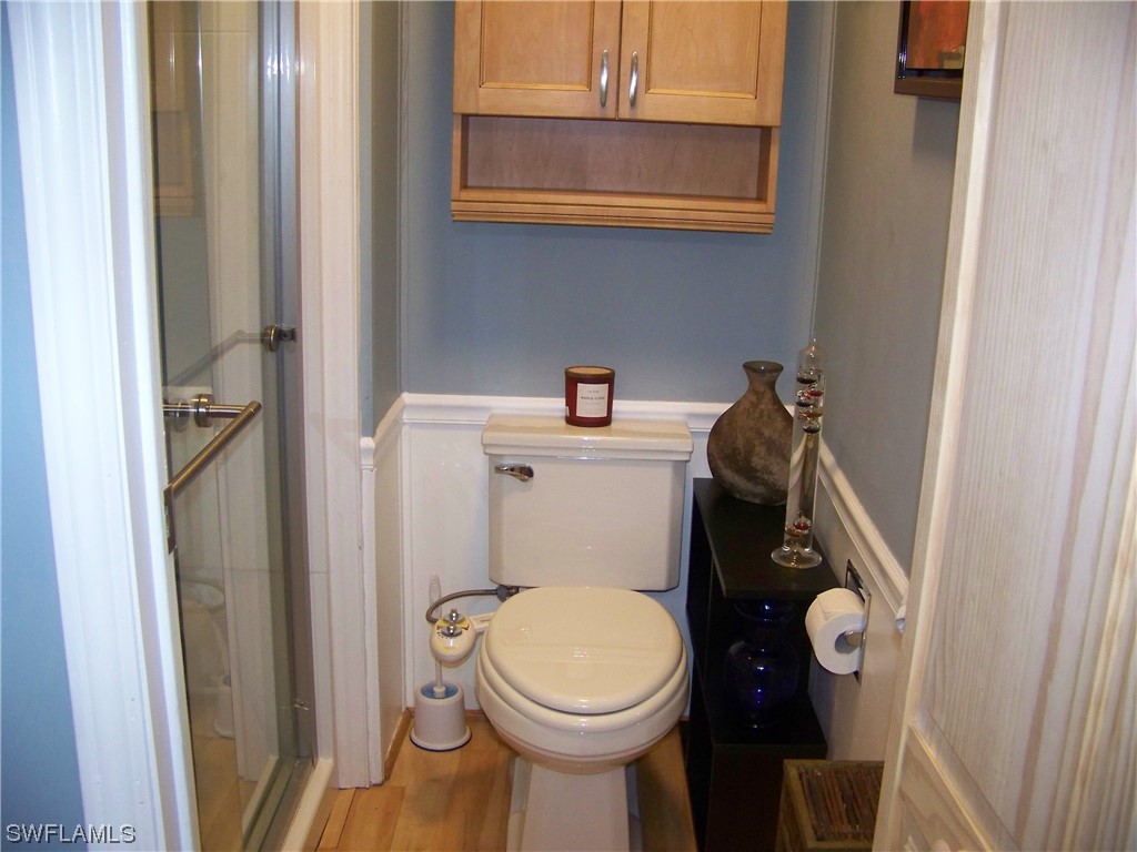 15550 Burnt Store Road, Unit 51 Punta Gorda, FL 33955 - Photo 31 of 50 a bathroom with a toilet and a sink