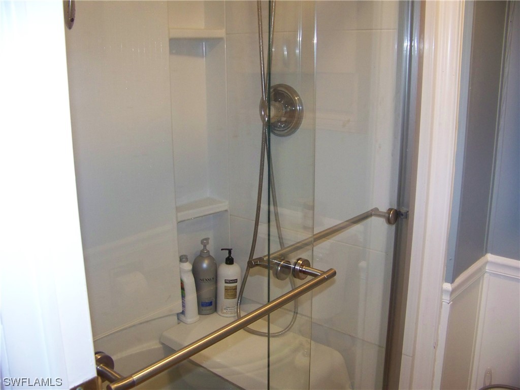 15550 Burnt Store Road, Unit 51 Punta Gorda, FL 33955 - Photo 32 of 50 a bathroom with a shower