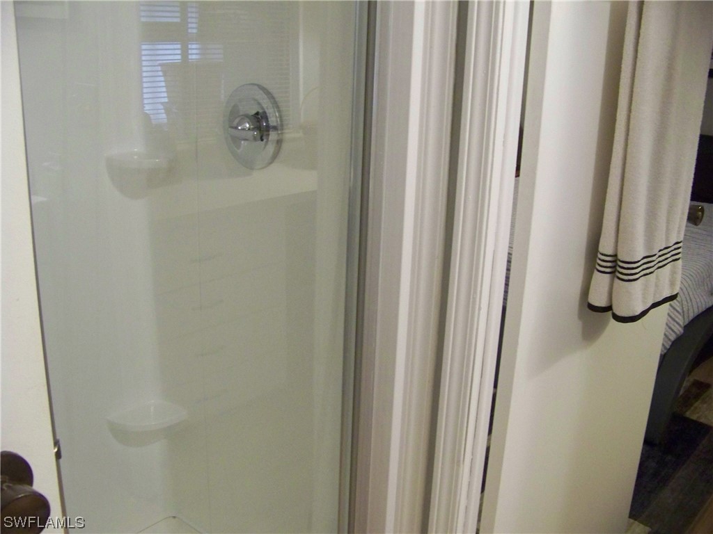 15550 Burnt Store Road, Unit 51 Punta Gorda, FL 33955 - Photo 38 of 50 a bathroom with a shower
