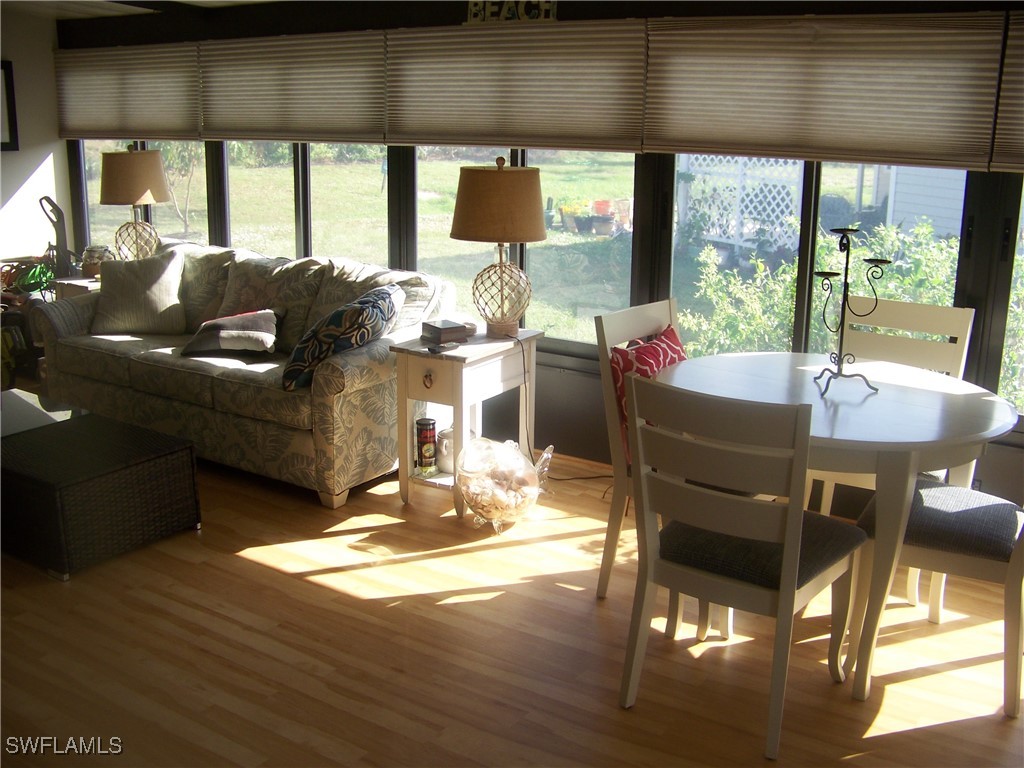 15550 Burnt Store Road, Unit 51 Punta Gorda, FL 33955 - Photo 41 of 50 a view of a dining room with furniture window and outside view
