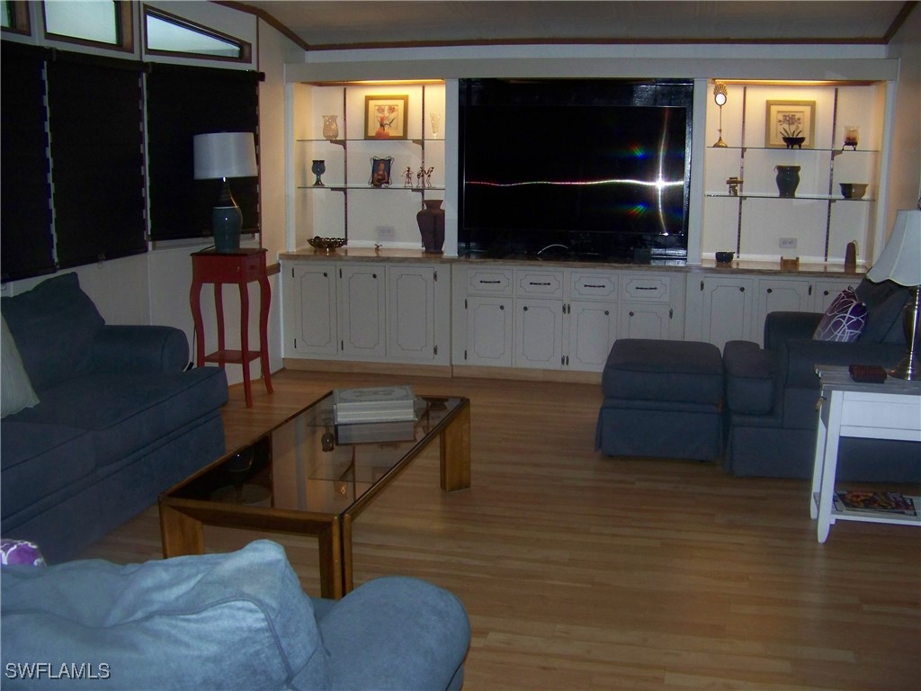 15550 Burnt Store Road, Unit 51 Punta Gorda, FL 33955 - Photo 8 of 50 a living room with furniture