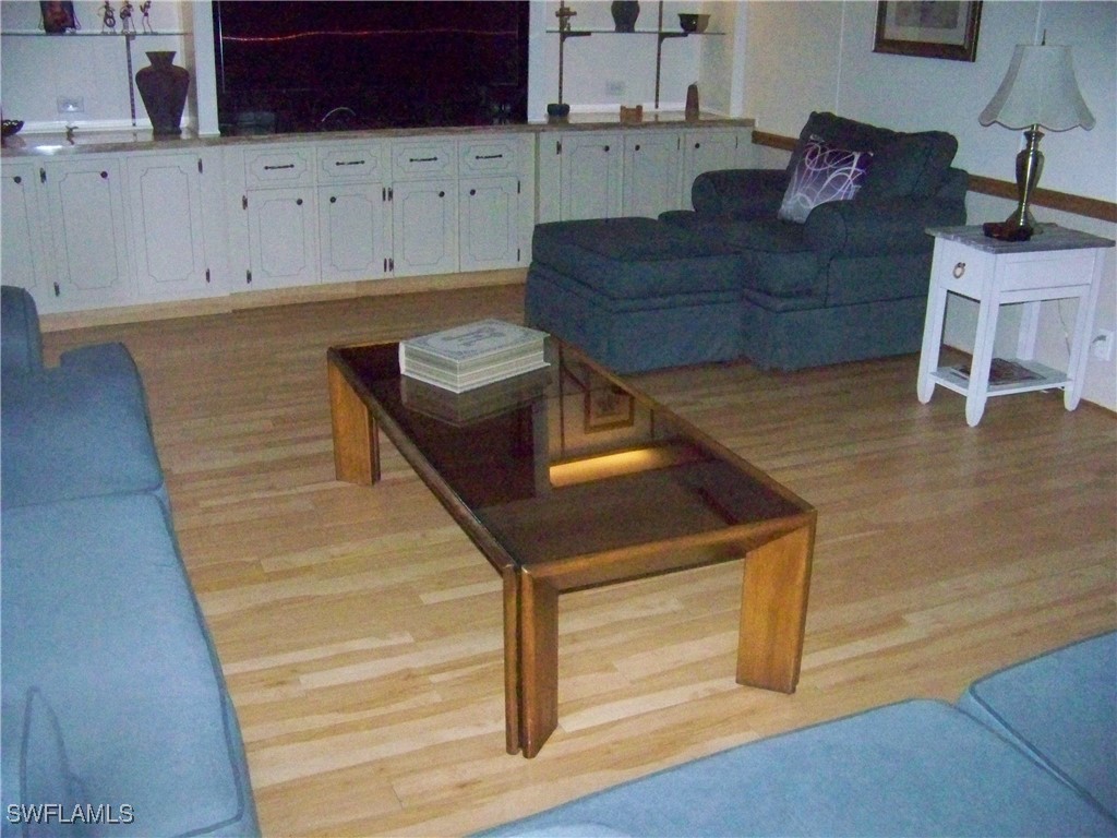 15550 Burnt Store Road, Unit 51 Punta Gorda, FL 33955 - Photo 9 of 50 a living room with furniture