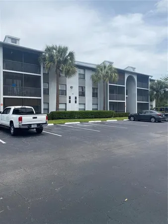 a view of street with parked cars