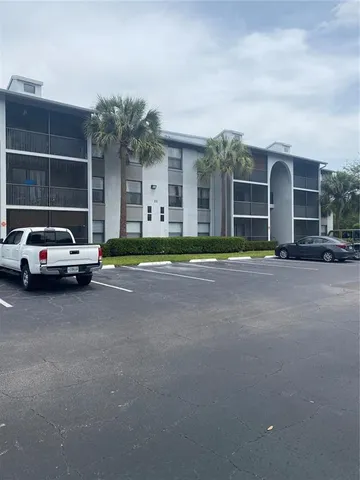 a view of street with parked cars
