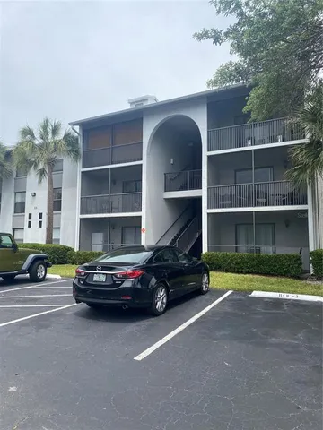 a car parked in front of a house
