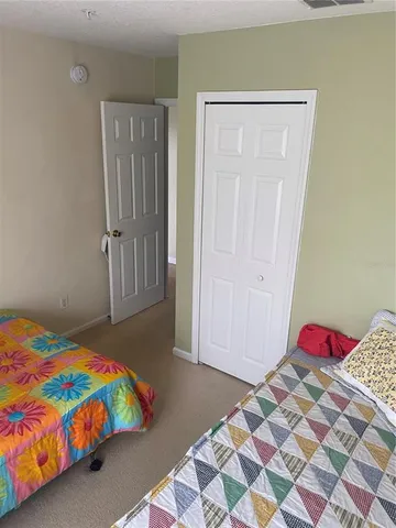 a bathroom with a sink toilet and a mirror