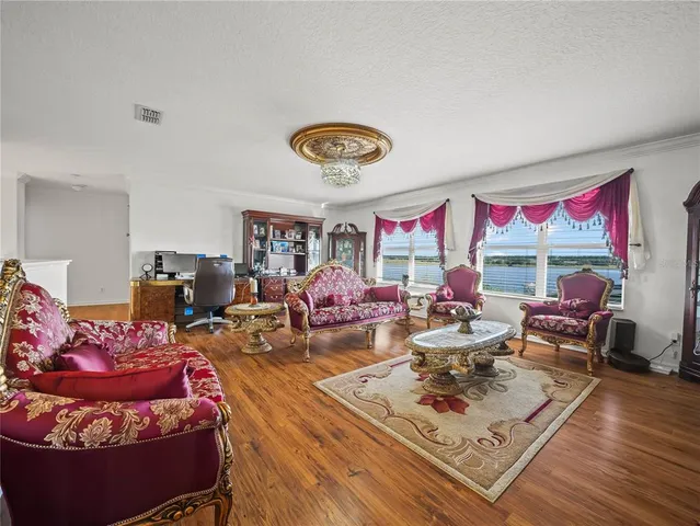 a kitchen with stainless steel appliances granite countertop a sink and a stove