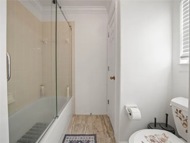 a workspace with furniture and a window