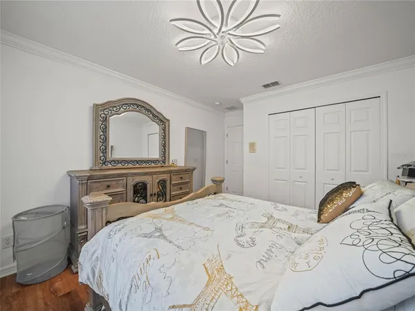 a living room with furniture and floor to ceiling windows