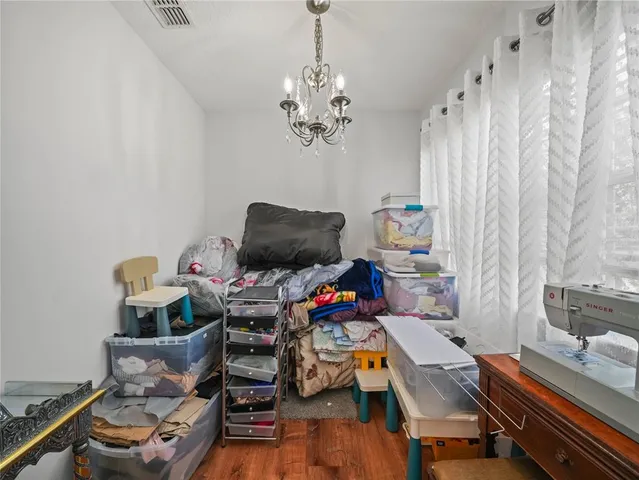 an aerial view of a residential houses with outdoor space