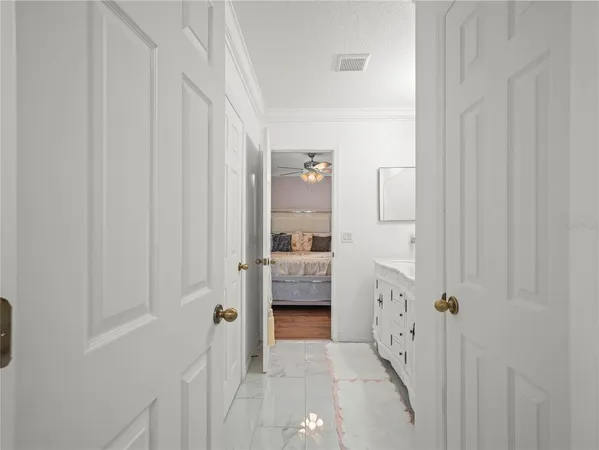 an aerial view of a swimming pool patio and outdoor seating