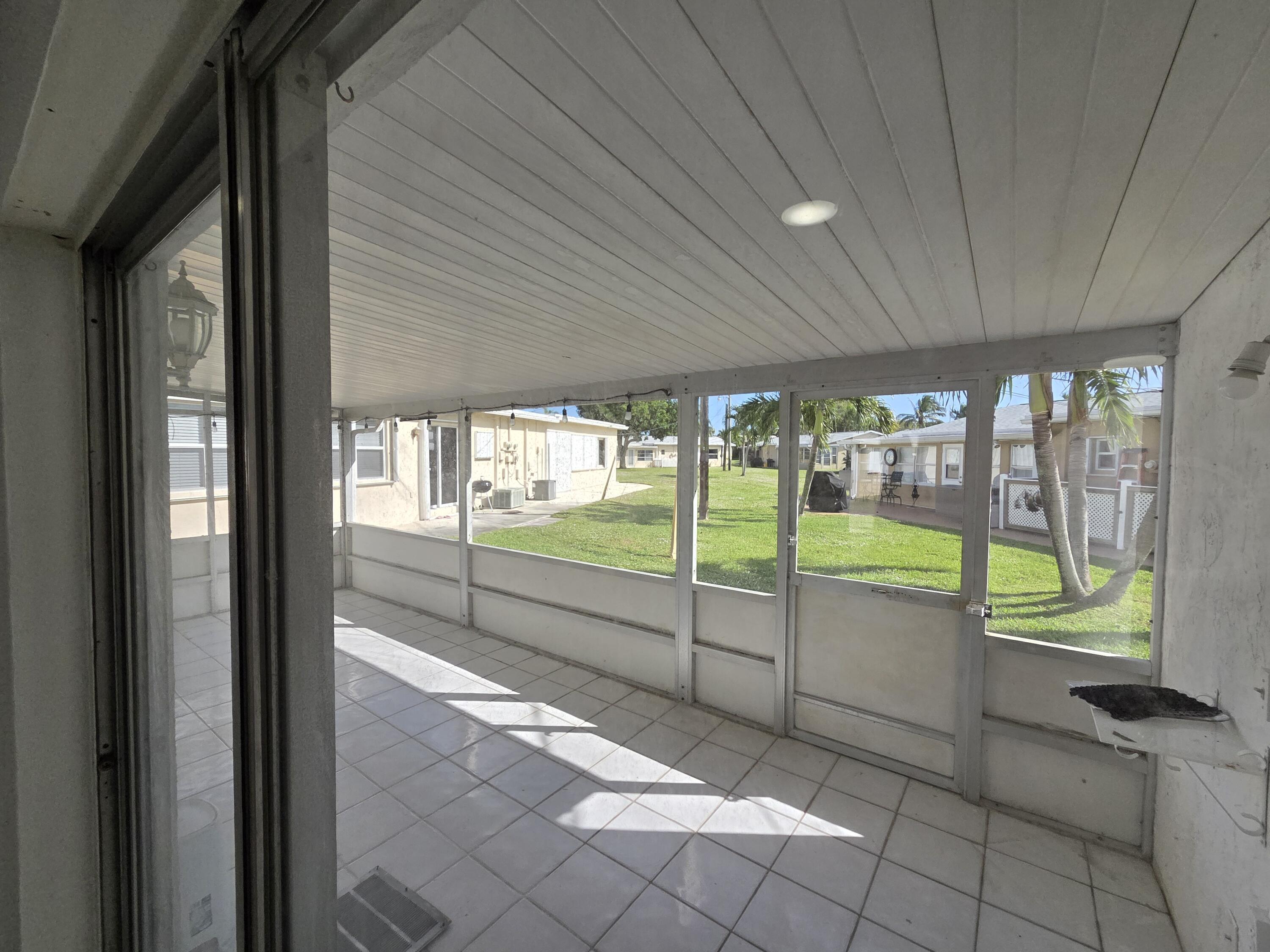 2847 Duke Lane Delray Beach, FL 33445 - Photo 12 of 17 a view of a backyard